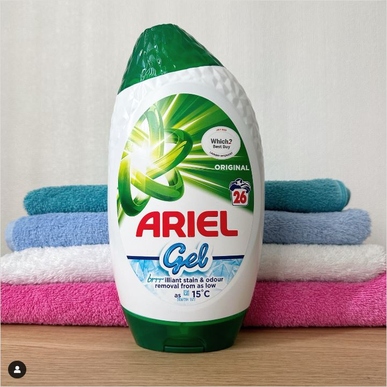 Ariel Gel with fresh clean laundry 