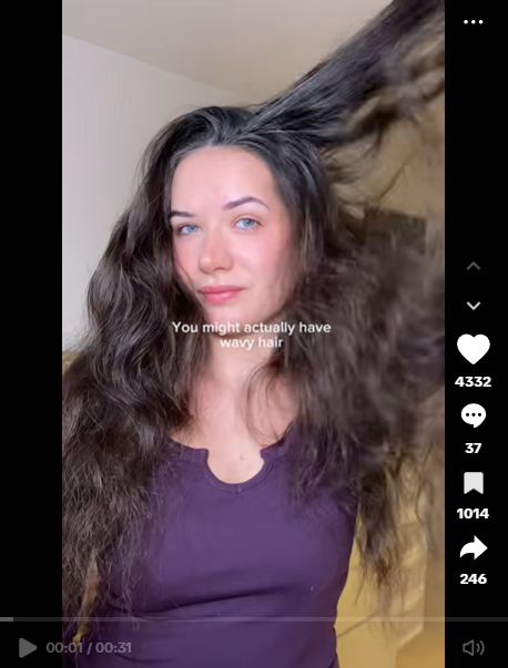 Woman with frizzy wavy hair