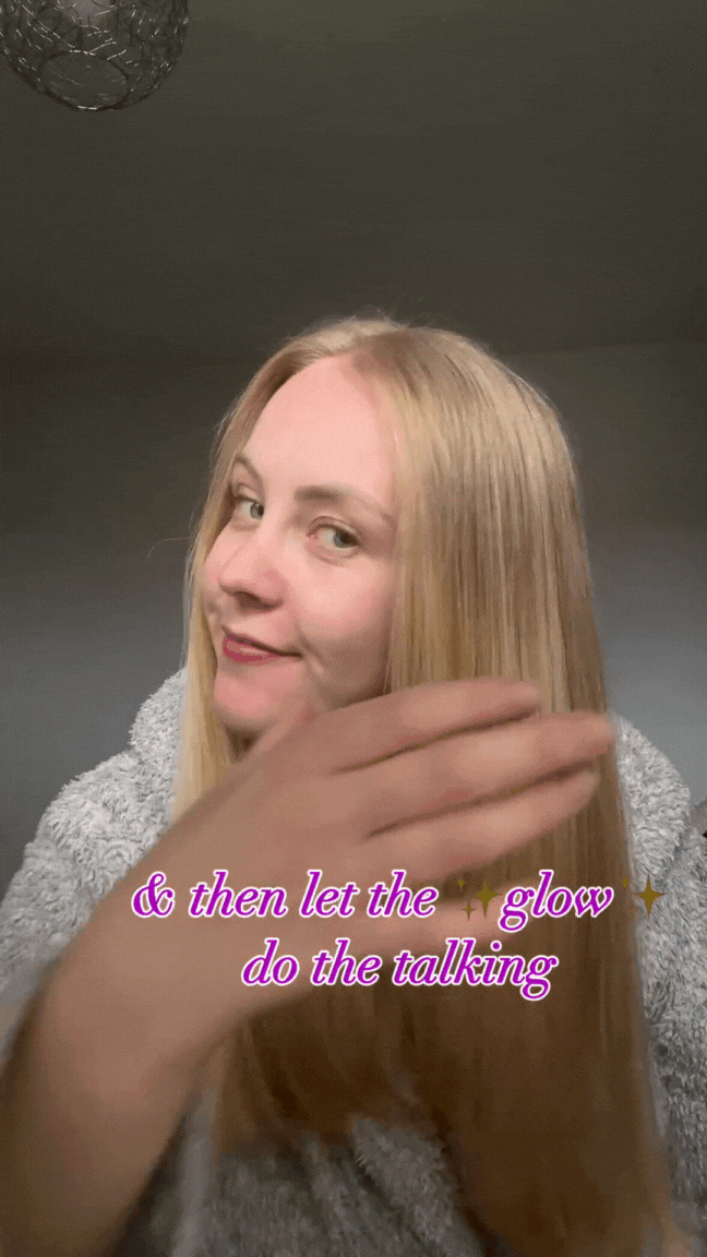 woman showing off shiny, silky hair