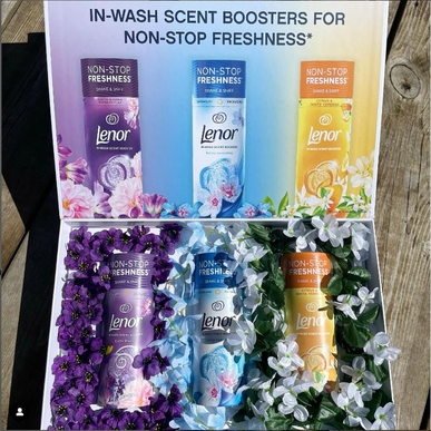 3 Lenor in wash scent boosters captured in the sun 