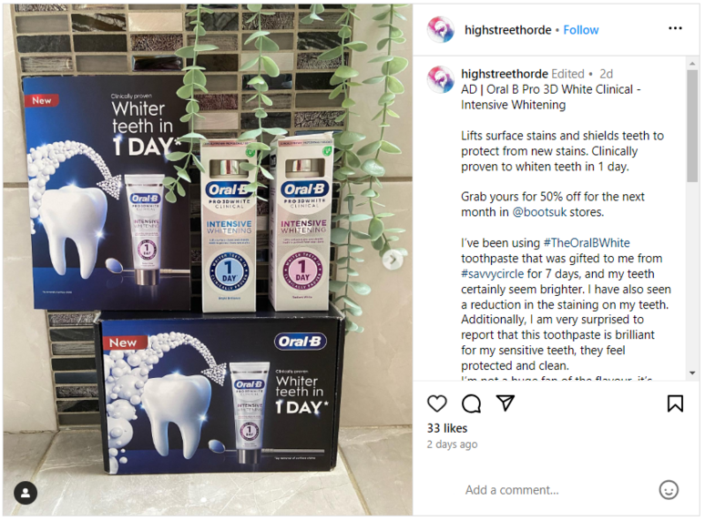 Oral-B Intensive Whitening tubes standing on a branded box and project handbook on the side