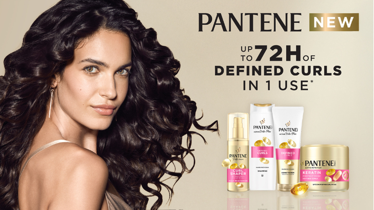 Pantene Defined Curls Welcome with a curly haired woman 